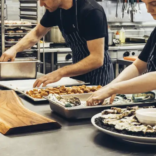 chefs preparing dishes